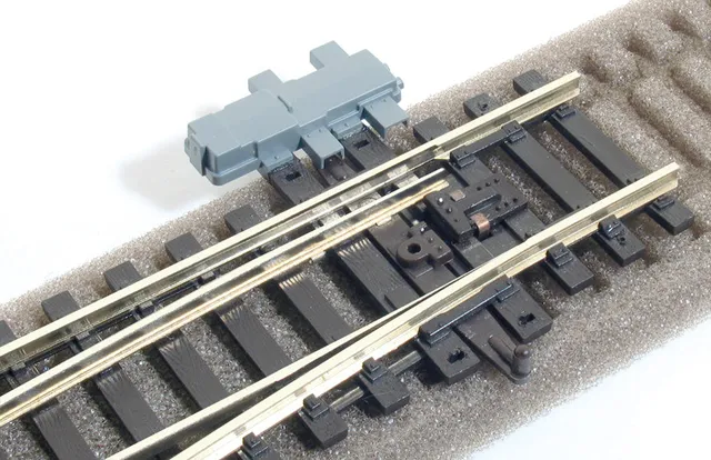 peco-sl47-weichenantrieb-attrappe-h0-oo-6er-pack image 1