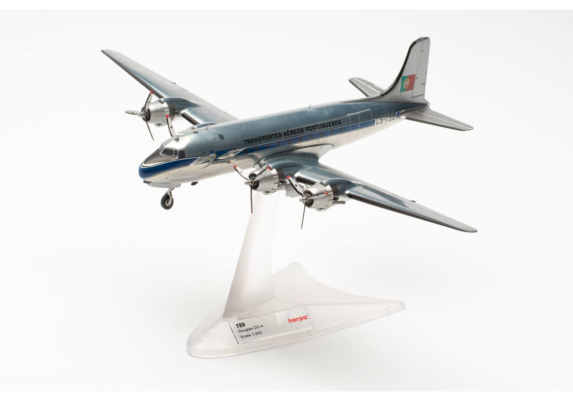 herpa-wings-tap-dc-4-cs-tsd-flugzeugmodell-1-200-mit-standfu image 5
