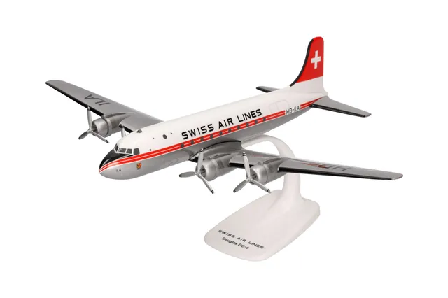 herpa-snapfit-swissair-douglas-dc-4-flugzeugmodell-1-125-mit-standfu image 1
