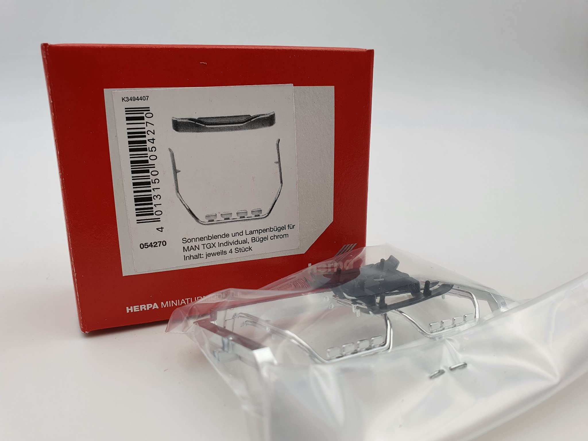 herpa-man-tgx-sonnenblende-lampenb-gel-zubeh-r-1-87-4er image 1
