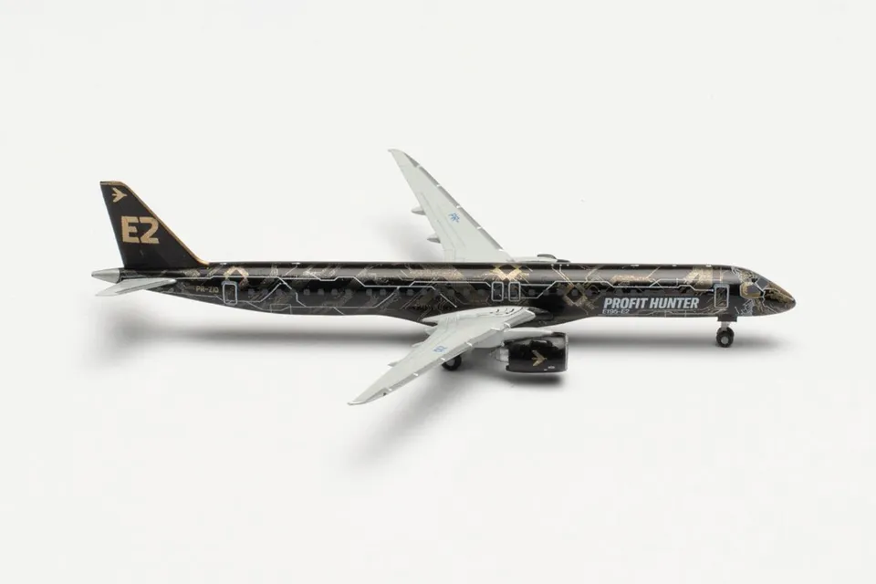 herpa-wings-embraer-e195-e2-tech-lion-flugzeugmodell-1-500-metall image 1
