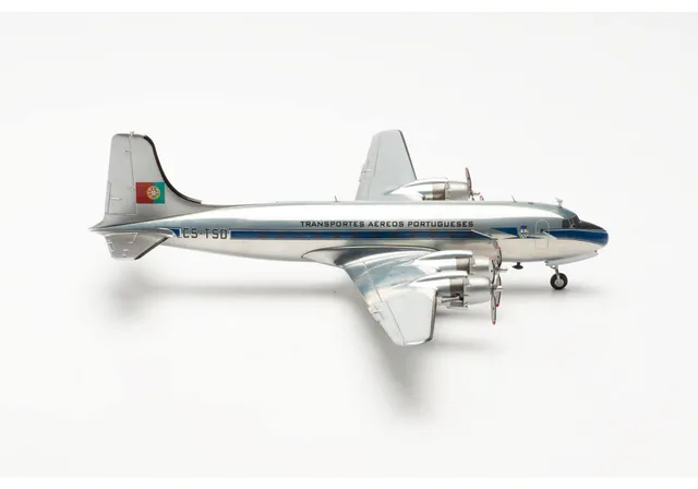 herpa-wings-tap-dc-4-cs-tsd-flugzeugmodell-1-200-mit-standfu image 1