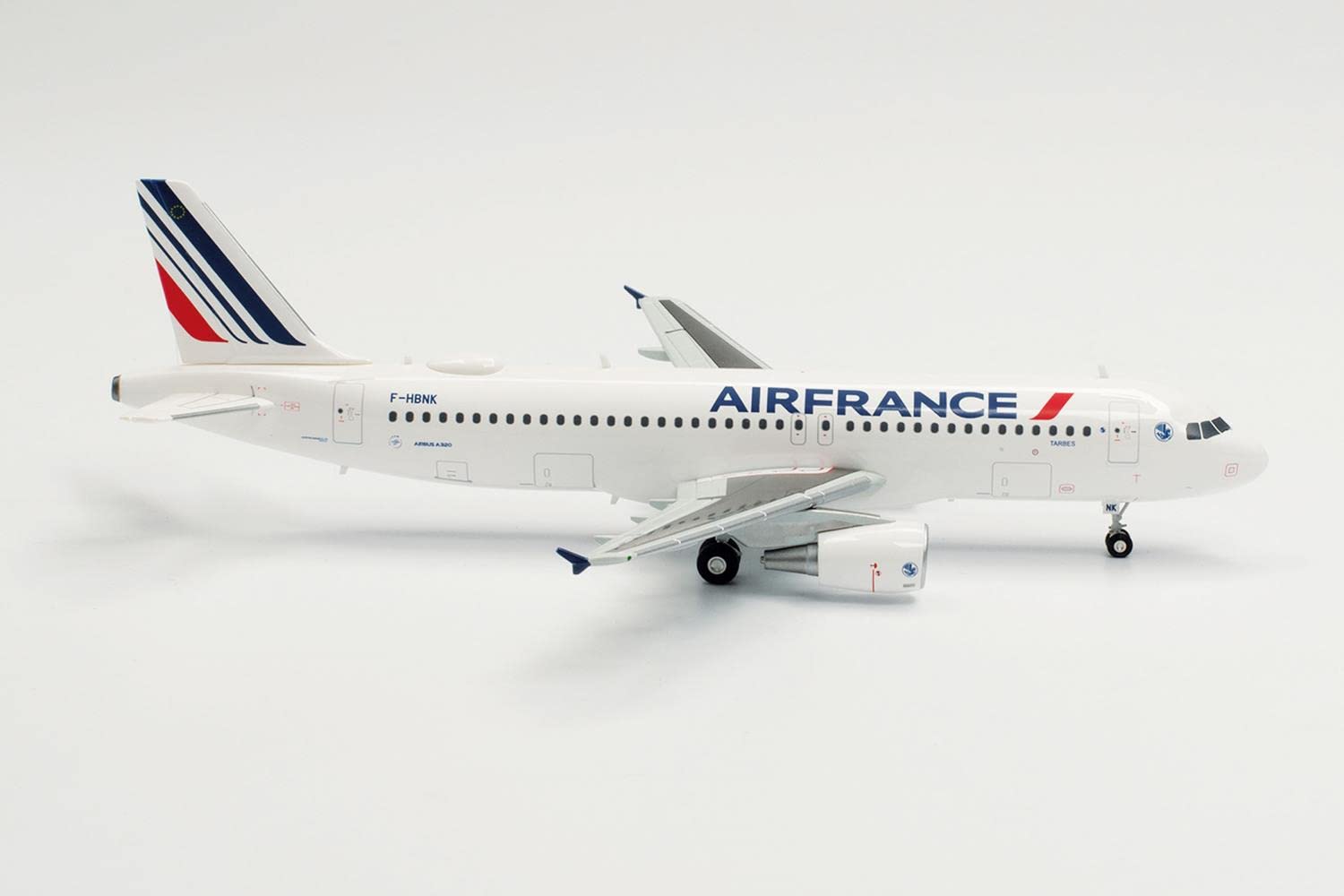 herpa-wings-air-france-airbus-a320-tarbes-flugzeugmodell-1-200-metall image 1
