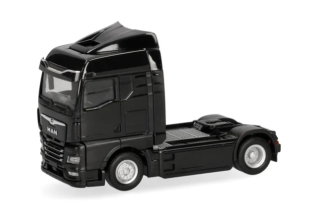 herpa-man-etgx-gm-zugmaschine-2-achs-schwarz-1-87 image 1